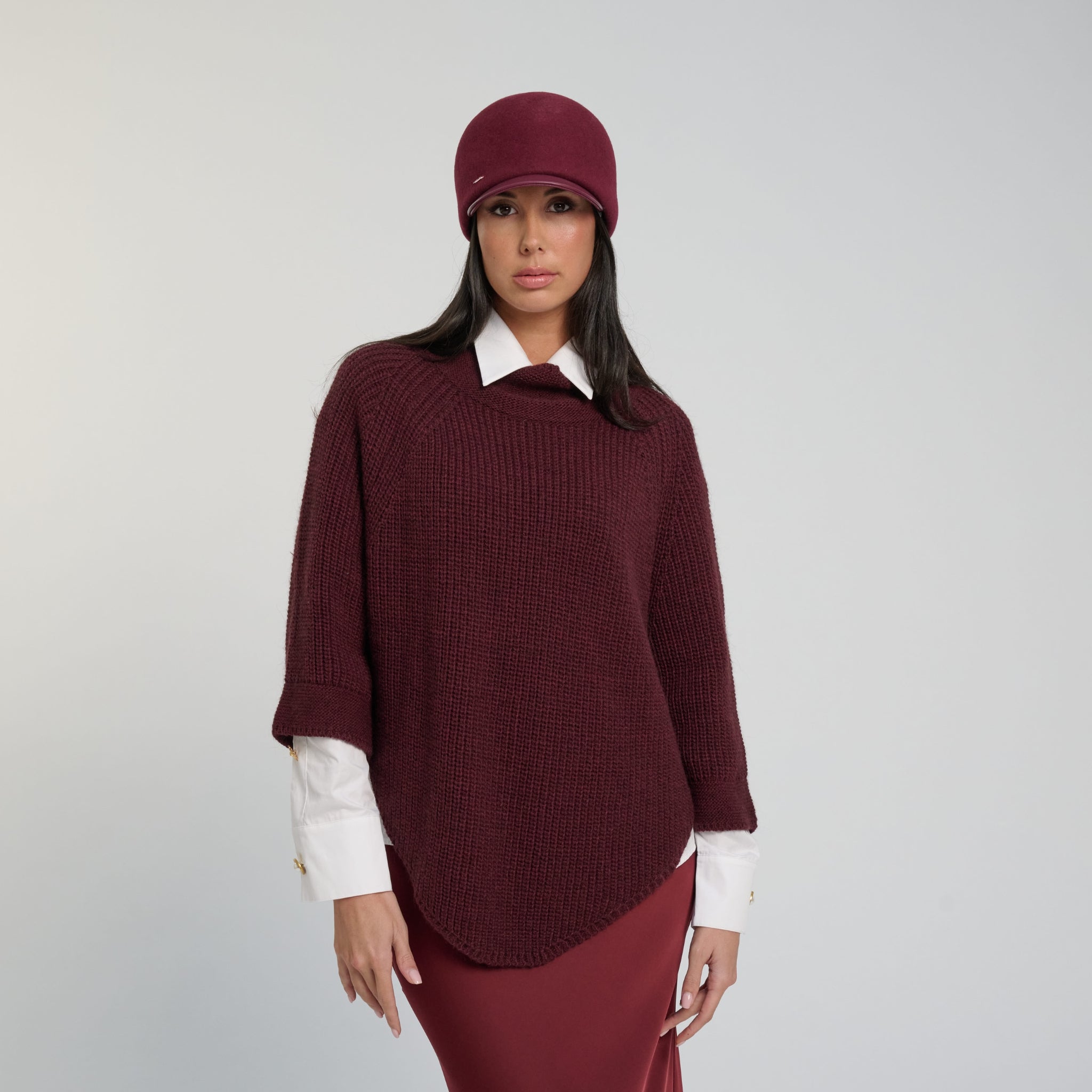 Pull col montant effet cape